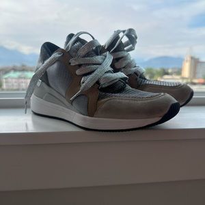Michael Kors casual/walking “runner” style shoes. Worn a couple times indoors.